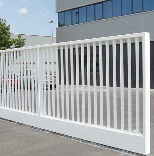 Puerta corredera industrial con barrotes a medida compra online