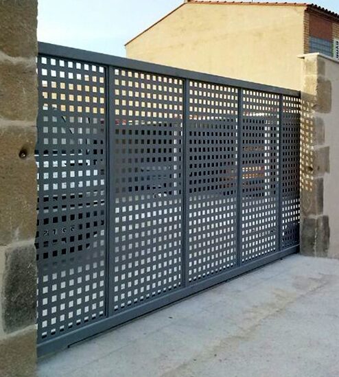 Puerta corredera de chapa perforada a medida compra online